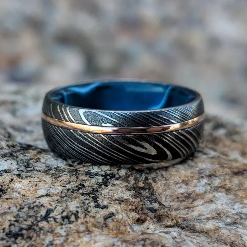 Damascus Steel Men's Wedding Band with 14k Rose Gold Inlay and Blue Ocean Sleeve