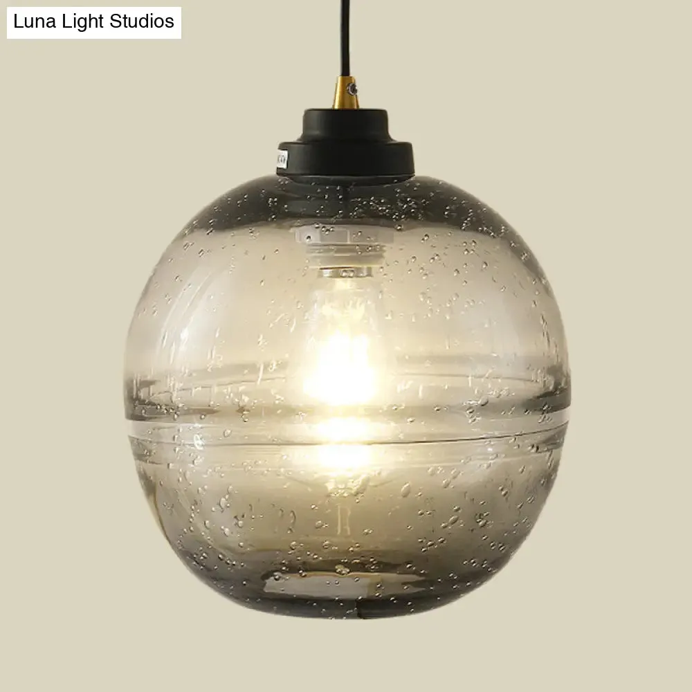 Modern Black Ball Pendant Light with Smoke Gray Bubble Glass - Single Head Suspension