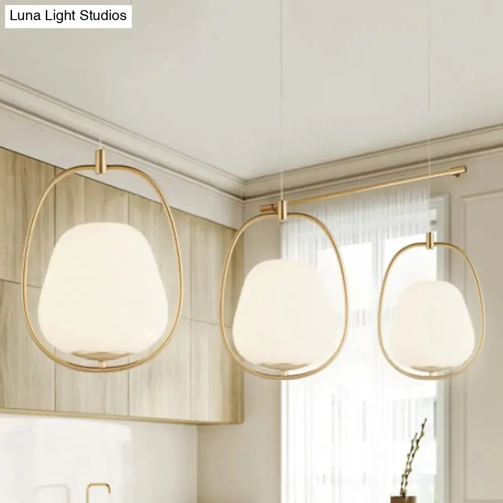 Modern Gold Iron Ring Pendant Lamp with White Glass - Oval Dining Room Fixture