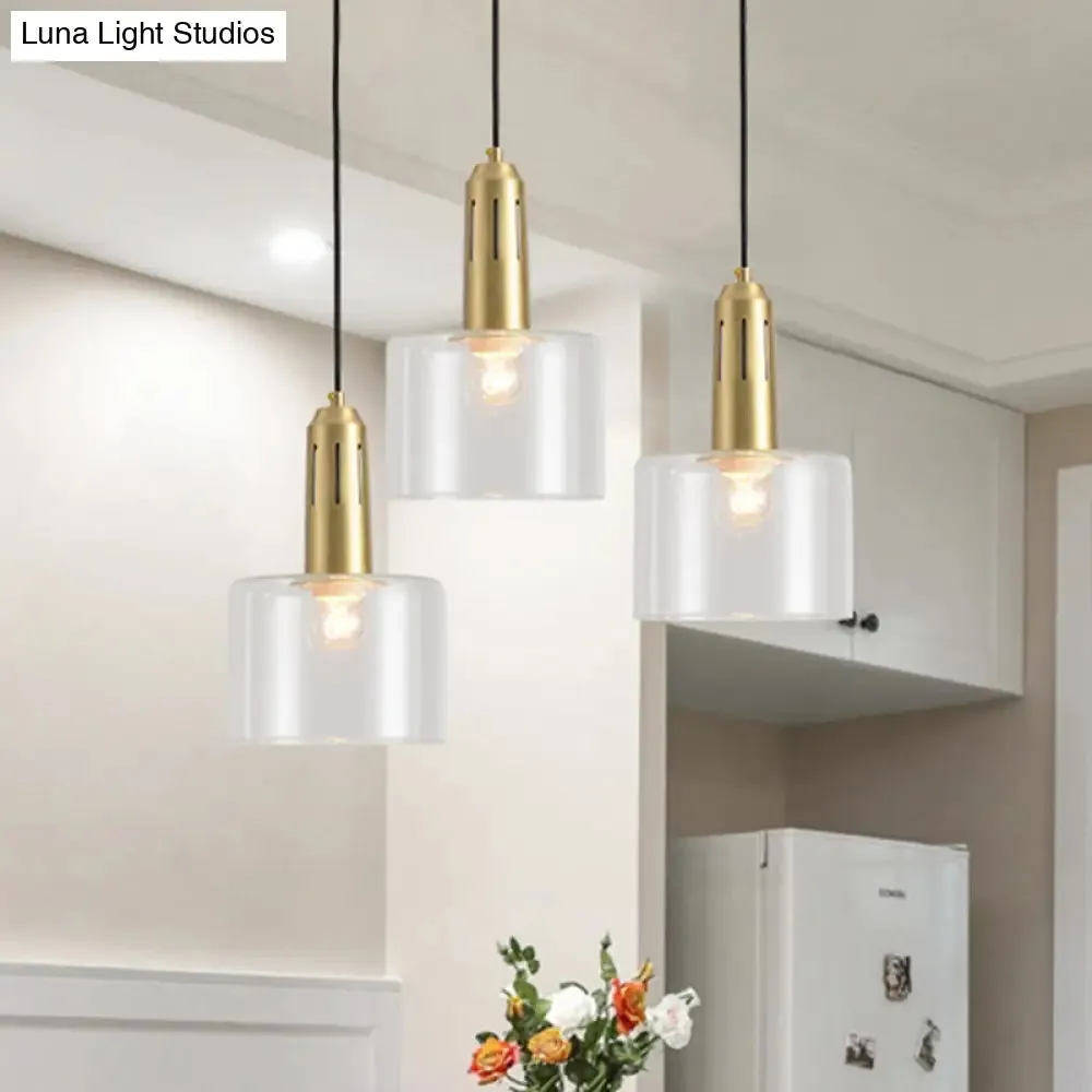 Postmodern Brass Pendant Lamp with Clear Glass Shade: Sleek Dining Room Hanging Light