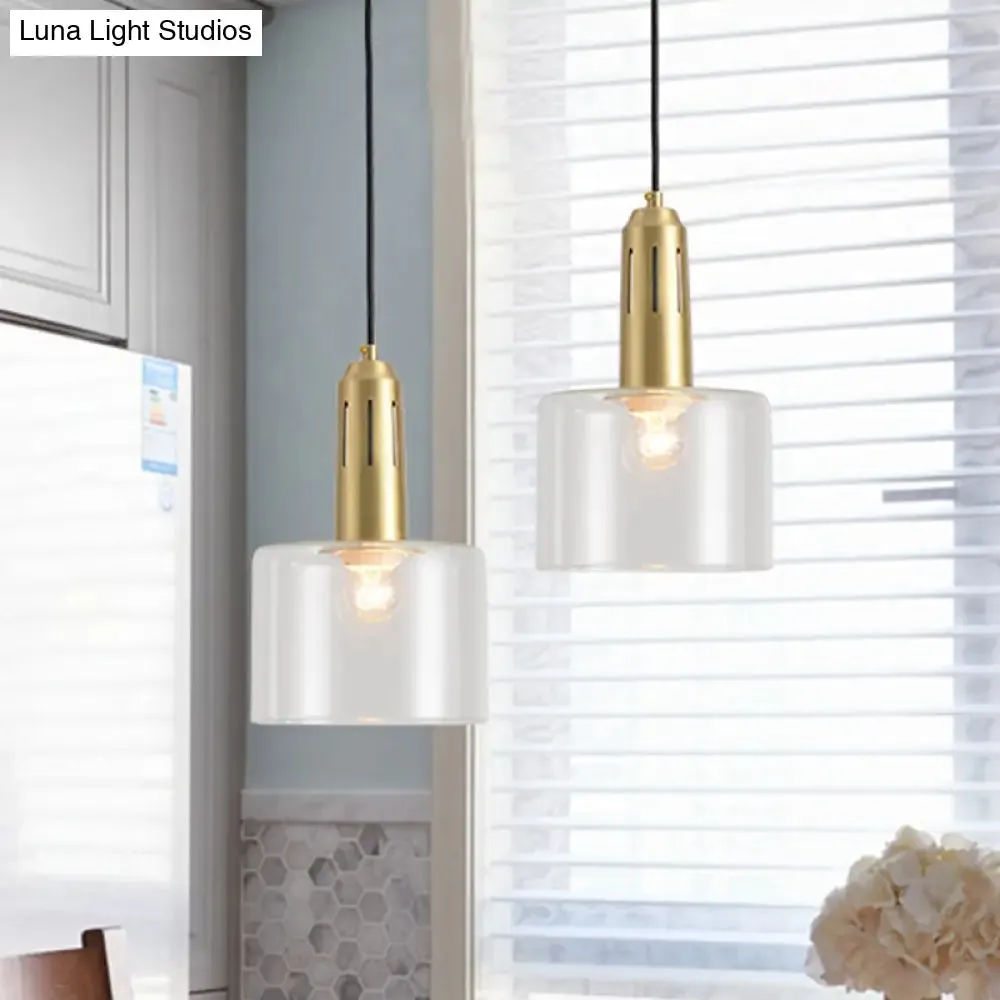 Postmodern Brass Pendant Lamp with Clear Glass Shade: Sleek Dining Room Hanging Light