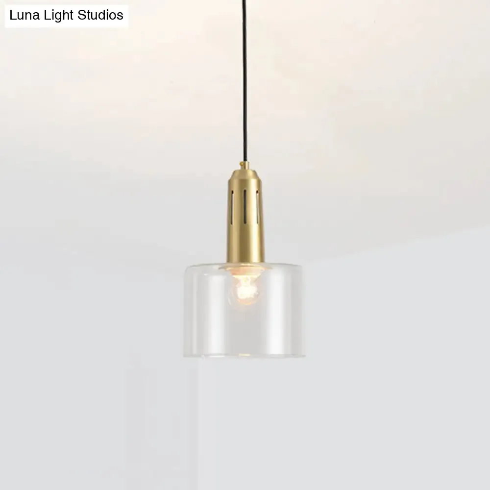 Postmodern Brass Pendant Lamp with Clear Glass Shade: Sleek Dining Room Hanging Light