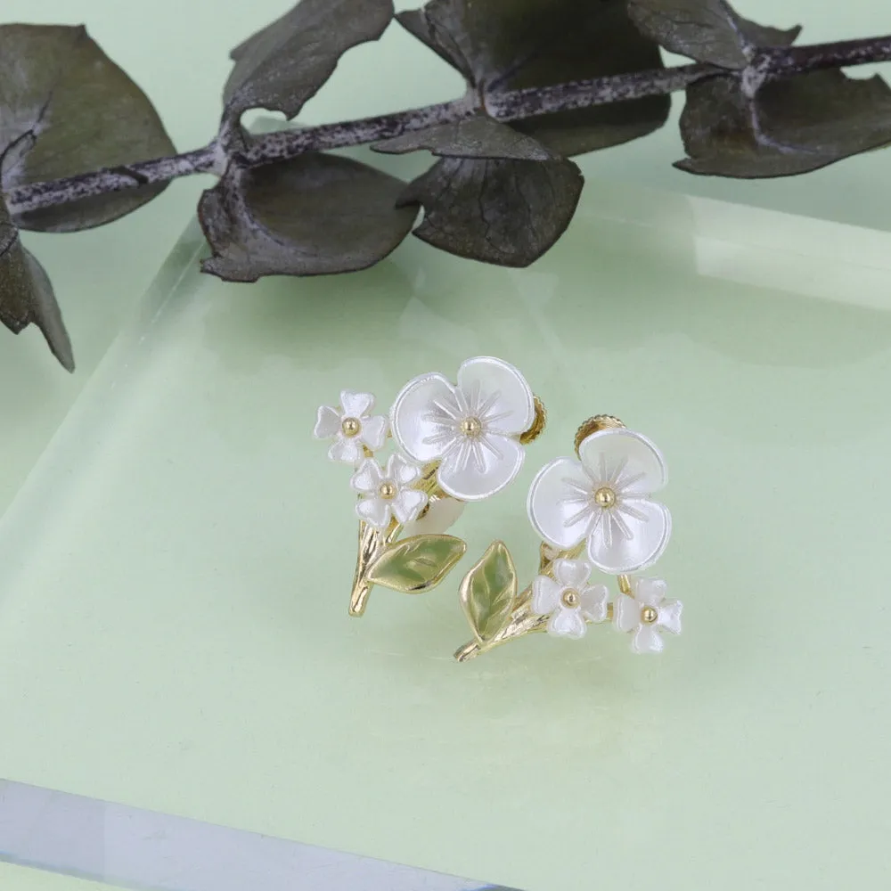 White Flower Clip On Earrings